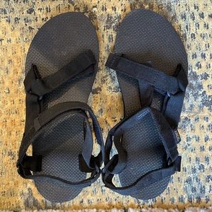 Black classic are a sandals.